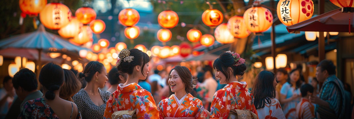 A group of people in colorful kimonos, illuminated by glowing lanterns overhead, smiling and conversing at a lively, bustling festival at dusk.
