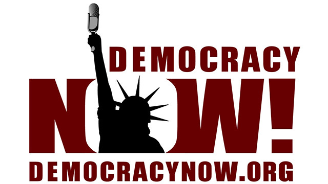 DemocracyNow.org logo: The Statue of Liberty is silhouetted in the "O" in "NOW!". Instead of a torch, she's holding a microphone aloft