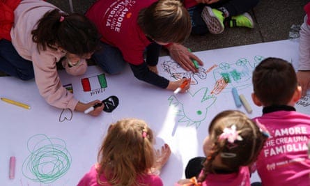 Children of LGBT couples draw during a protest in Milan.