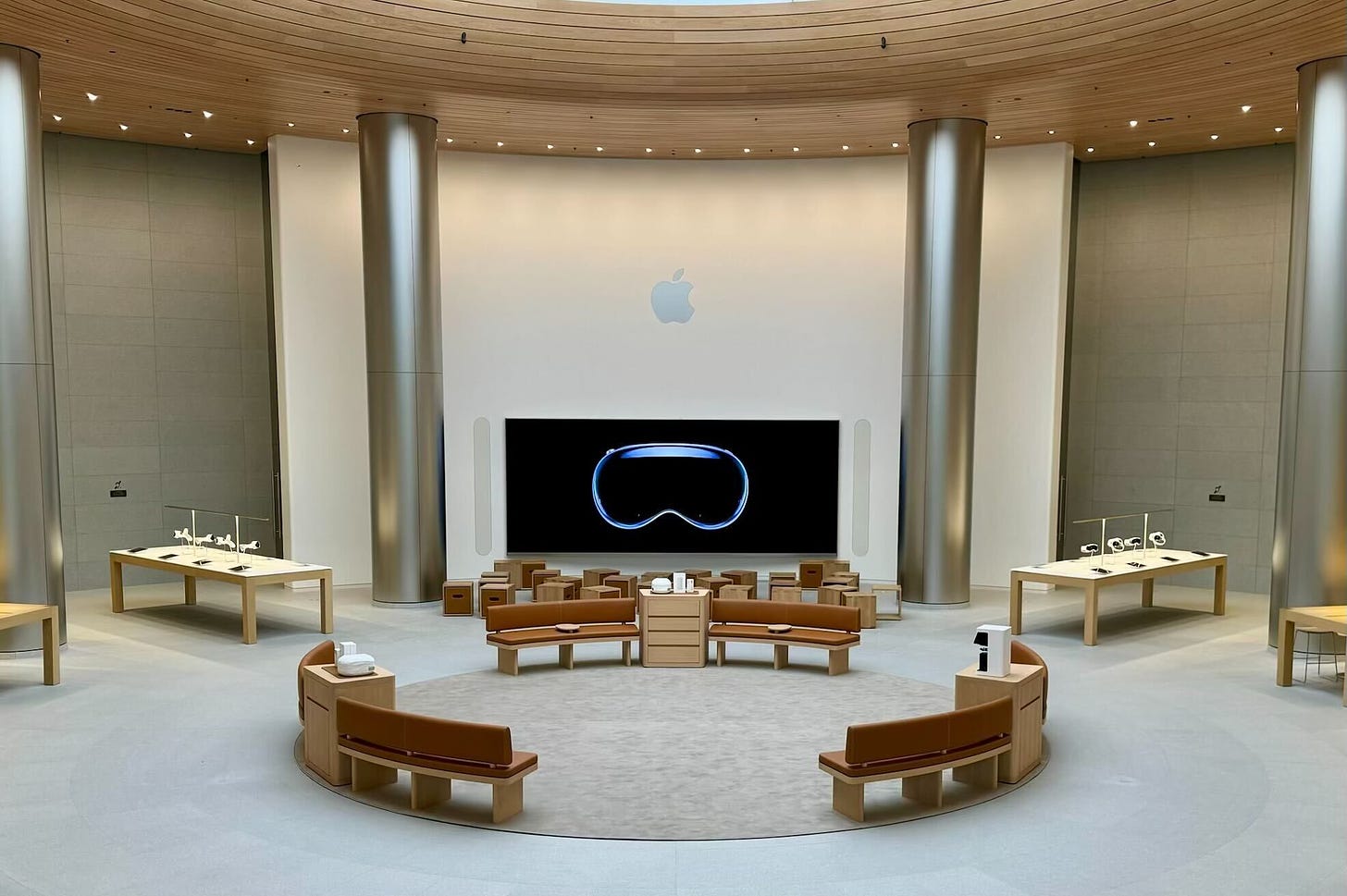 The circular Demo Zone at Apple Jing'an. The sofas are placed directly below the store's oculus.