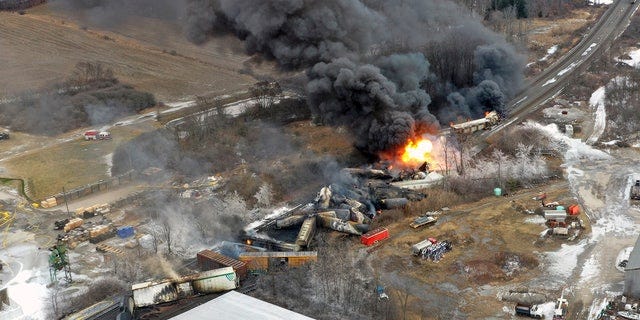 This photo taken with a drone shows portions of a Norfolk Southern freight train that derailed in eastern Ohio.