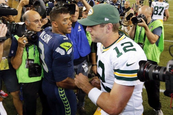 aaron rodgers feels russell wilson for win against packers 2015