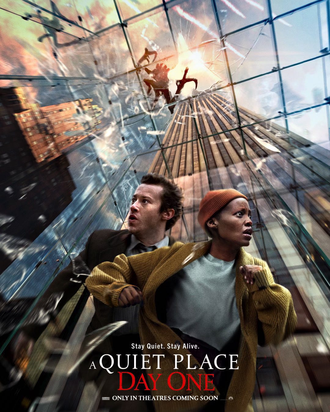 A movie poster for A Quiet Place: Day One. The camera is pointed up at the interior of Apple Fifth Avenue's glass cube, which is shattering.