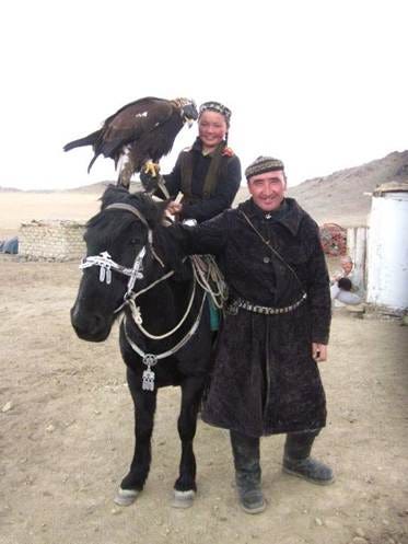 FIG 2.5. Aisholpan and her father Agalai, Eagle Festival, Ulgii, Mongolia, 2014. FIG 2.5. Aisholpan and her father Agalai, Eagle Festival, Ulgii, Mongolia, 2014.