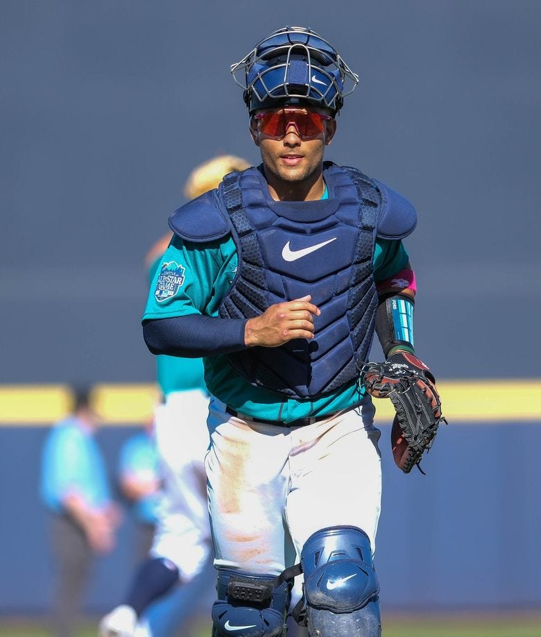 Mariners catcher Harry Ford during a spring training game against the Angels. (Dean Rutz / The Seattle Times)