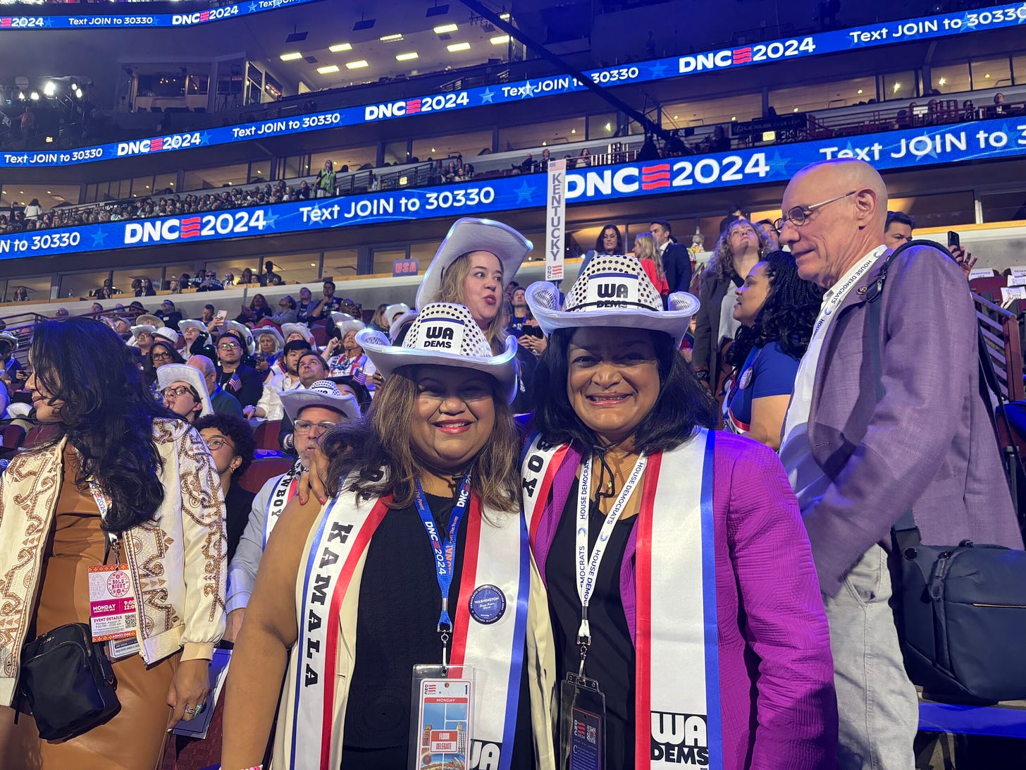 The story behind WA Democrats' light-up hats and 'Cowboy Kamala' sashes •  Washington State Standard