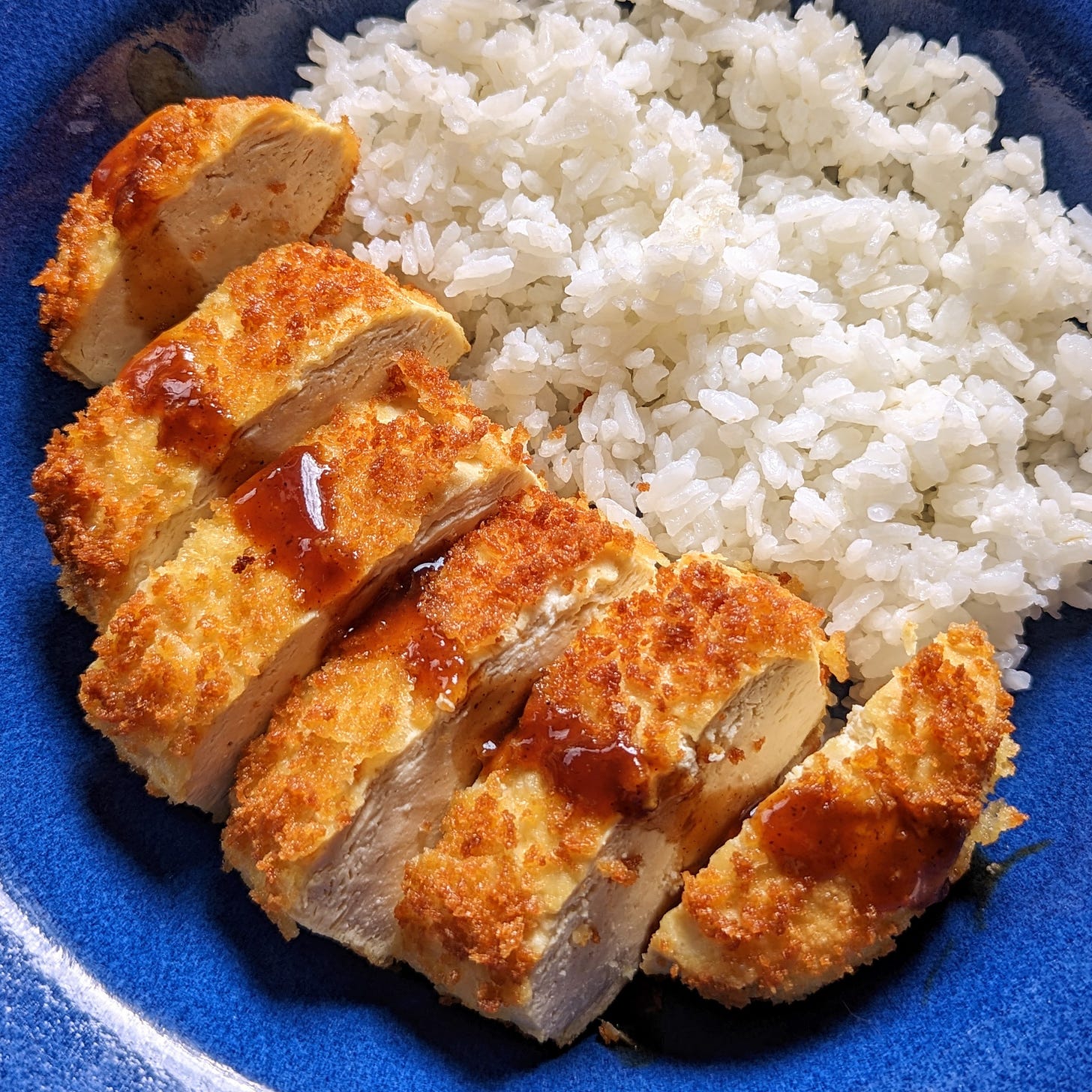 breaded tofu cutlet with sauce and rice