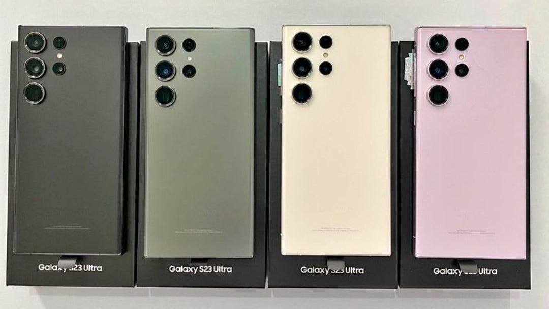All four Samsung Galaxy S23 Ultra phone color variants laid face down on their boxes