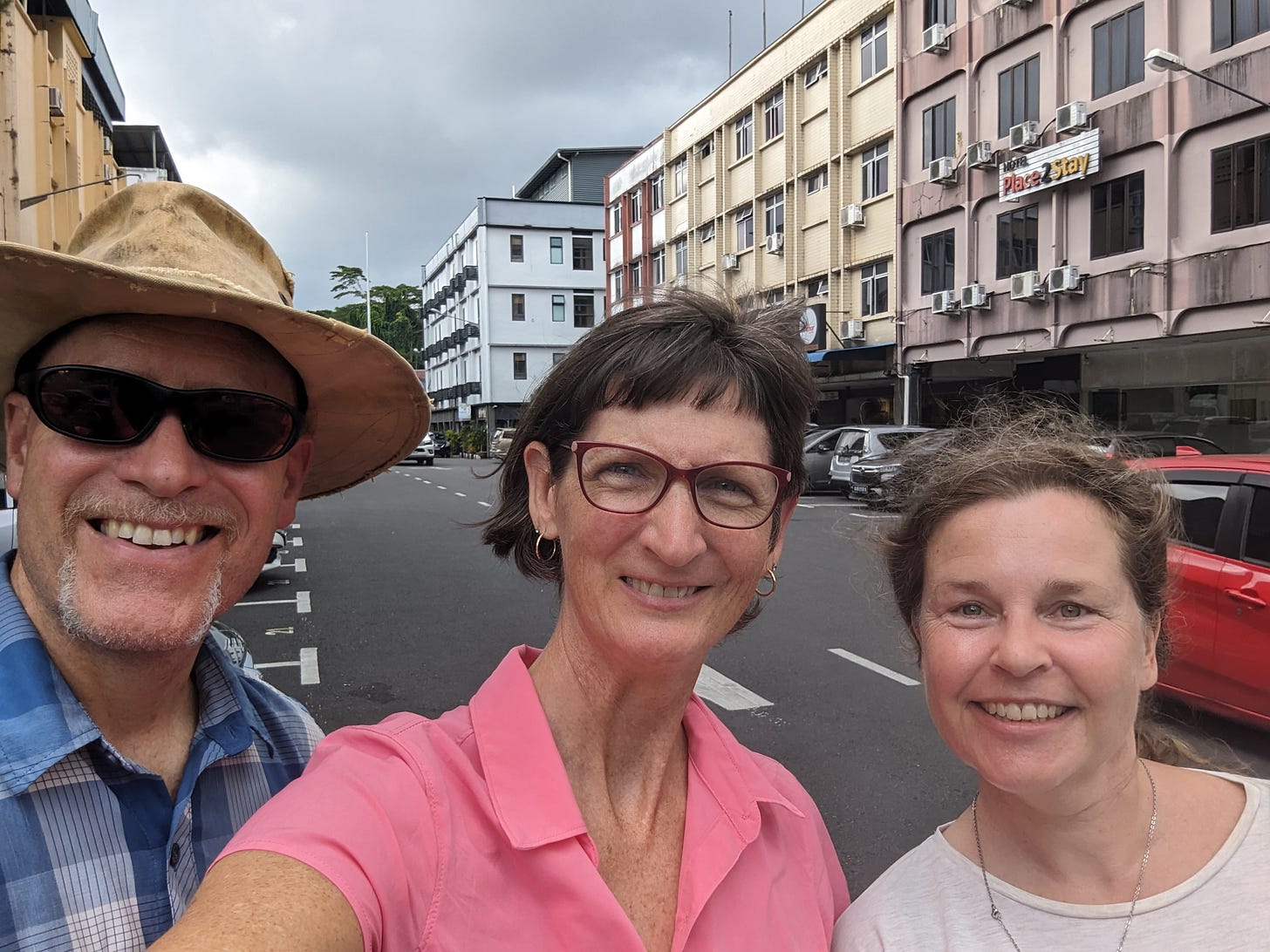 Andy, Sherry, and Sarah on a city street