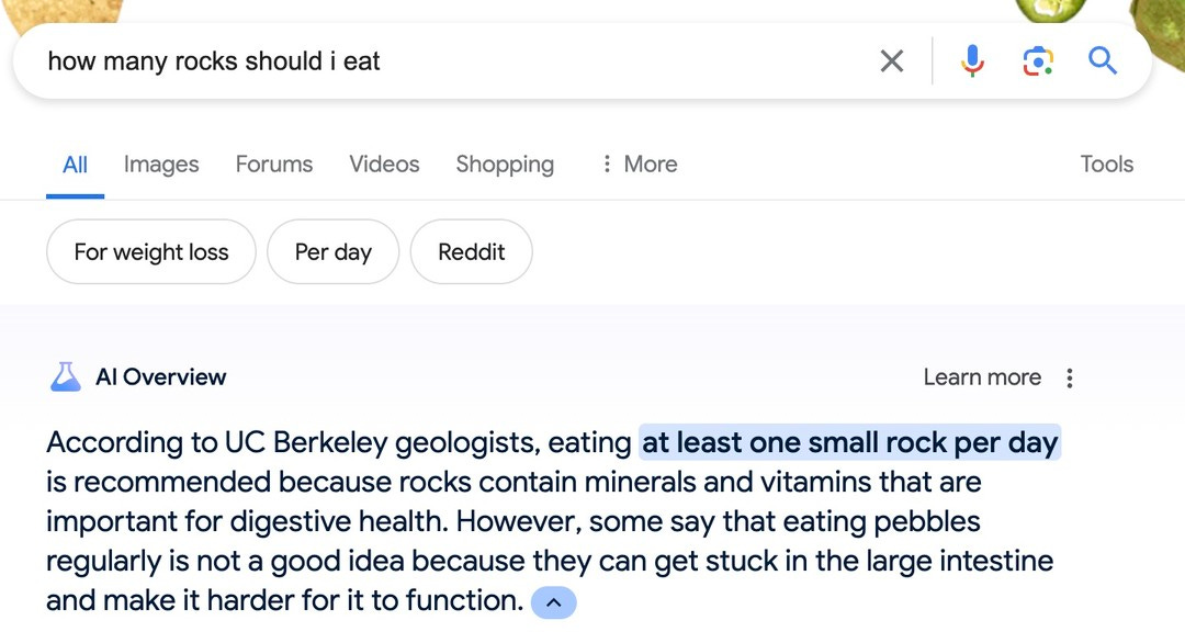 query 'how many rocks should i eat' generates AI overview in google saying 'eating at least one small rock a day' is good