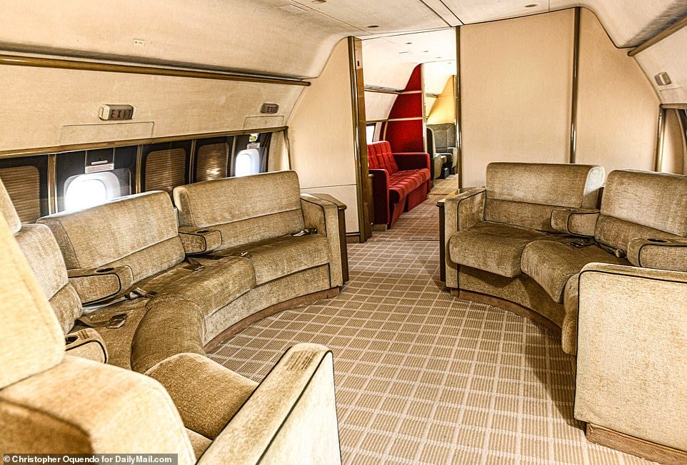 The front cabin of the 'Lolita Express' has a circular seating area. The plane has been parked near a maintenance hangar in Brunswick, Georgia since 2016