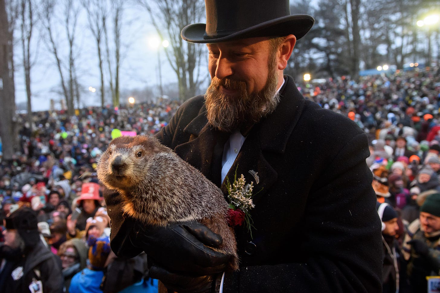 Handler AJ Dereume holds Punxsutawney Phil after he did not see his shadow predicting an early spring during the 133rd annual Groundhog Day festivities on February 2, 2019 in Punxsutawney, Pennsylvania.