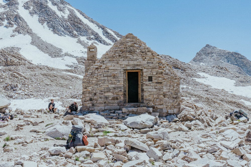 A hut on the top of Muir pass erected in 1930 by the Sierra Club in honor of John Muir.  The hut is designed to protect hikers traveling through the talus fields when lightening is present.  On a sunny day, it serves as a great place to take a seat …