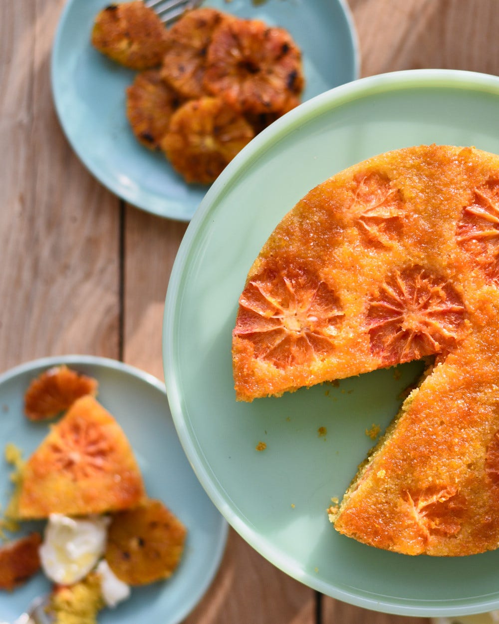 Blood orange and saffron polenta cake with burnt oranges and ginger crème fraîche