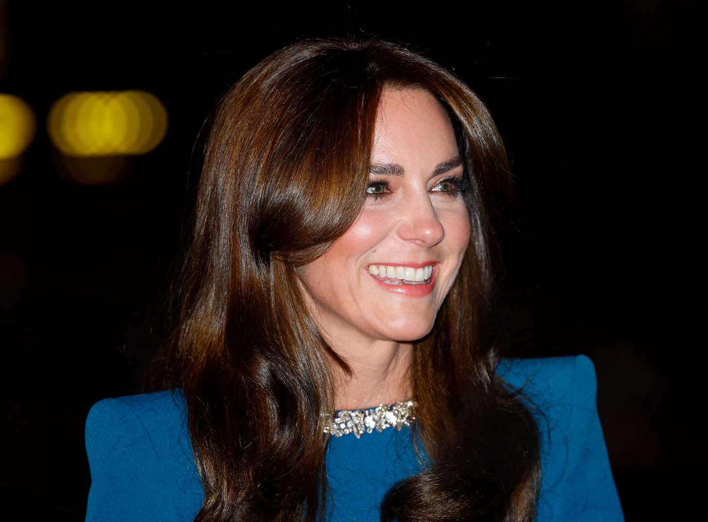 Kate Middleton wearing blue dress and glamorous makeup for Royal Variety Performance