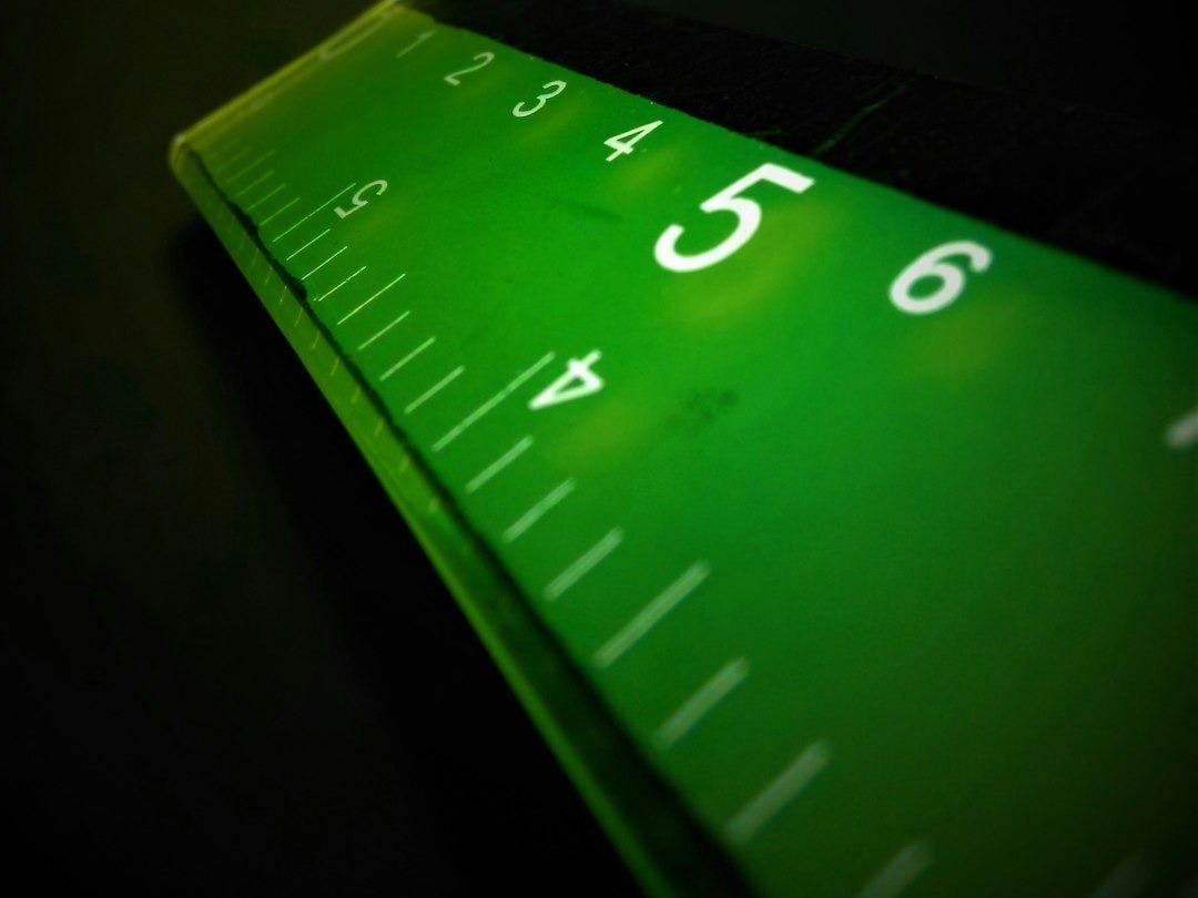 a close up of a ruler on a table