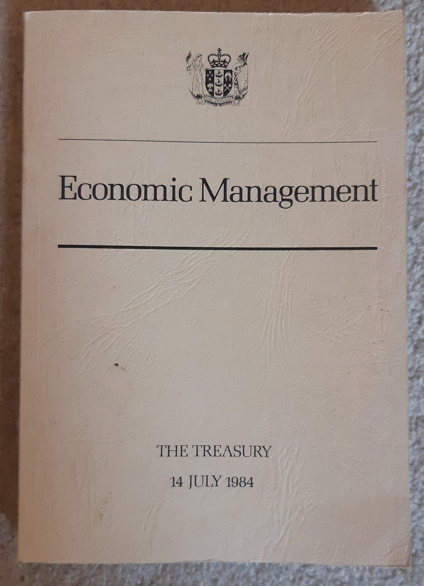 Photo of cover page of Treasury's 1984 Briefing to Income Minister titled "Economic Management"