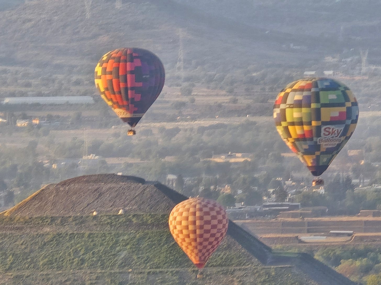 Balloons over a pyramid at Teotihuacán