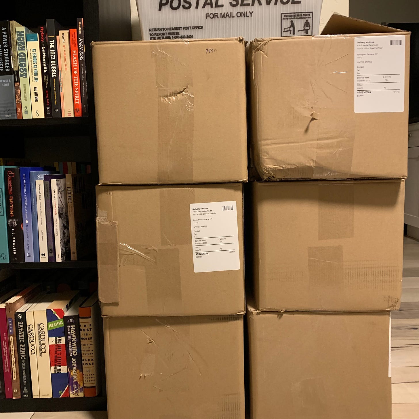 six boxes of CDs, waiting to be shipped to you!