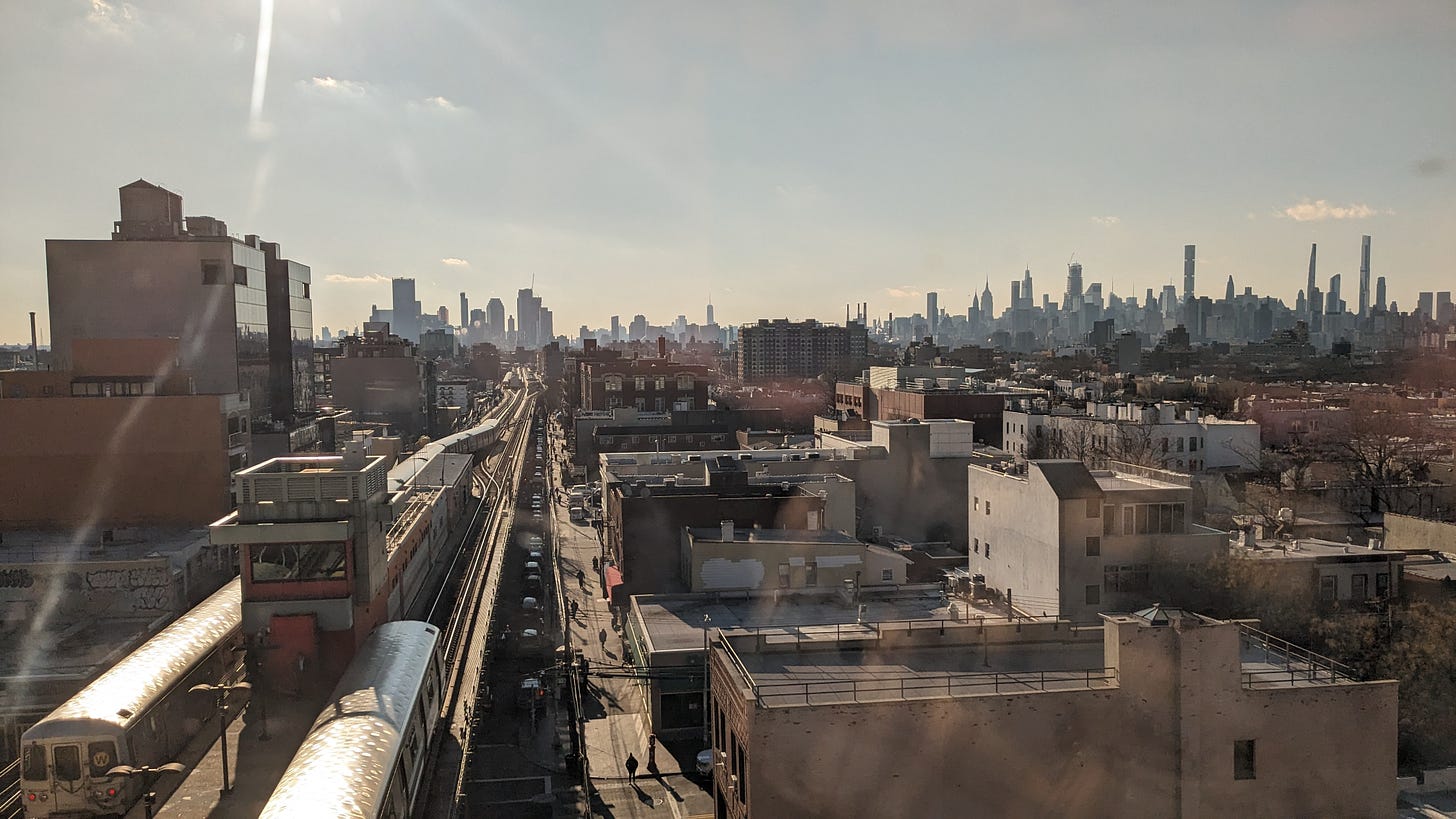 Manhattan skyline and outer borough rooftops