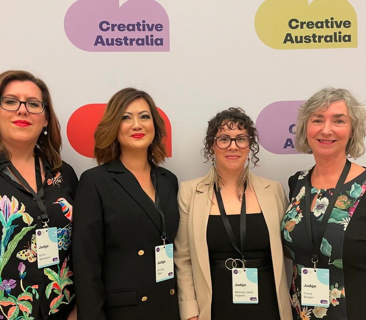 The four judges of the Prime Minister's Literary Awards in the children's category. Picture taken in front of the Creative Australia backdrop on the awards night.