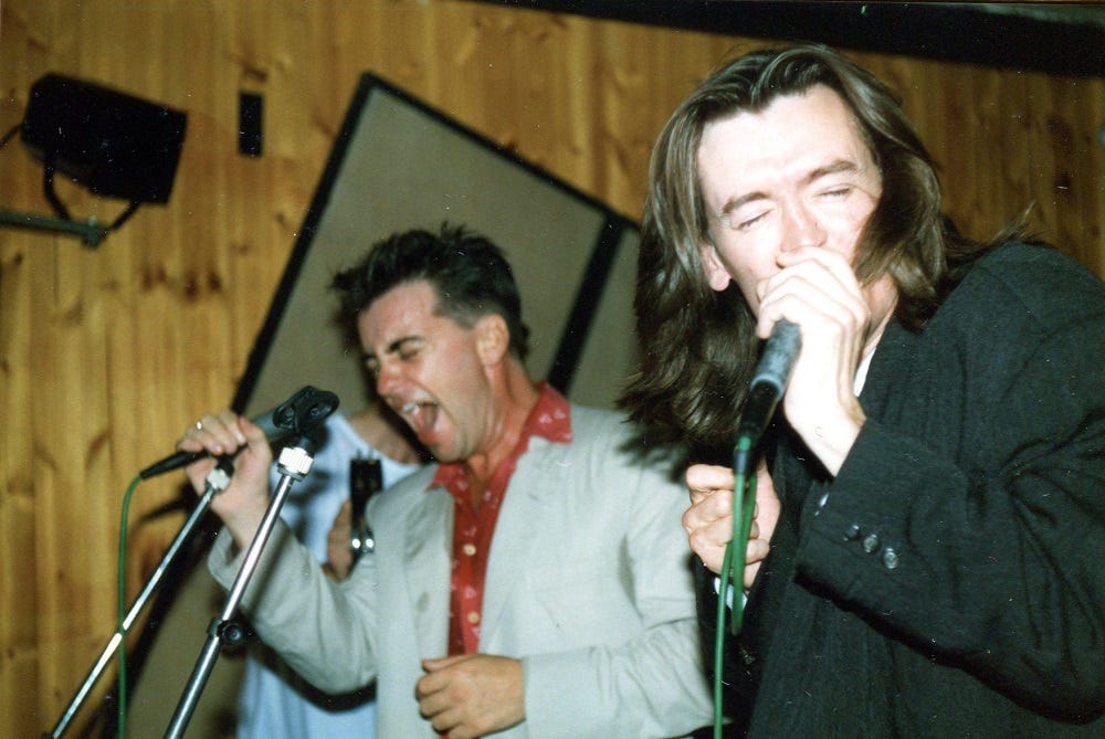 Enrico and Feargal singing.