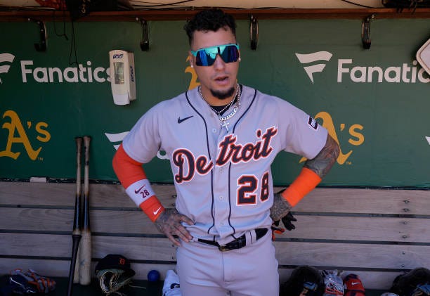 Javier Baez of the Detroit Tigers looks on from the dugout prior to the start of the game against the Oakland Athletics at RingCentral Coliseum on...