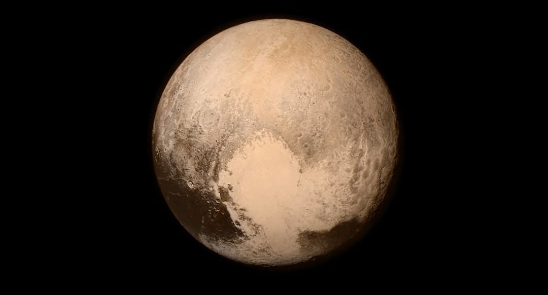 Pluto on a black background