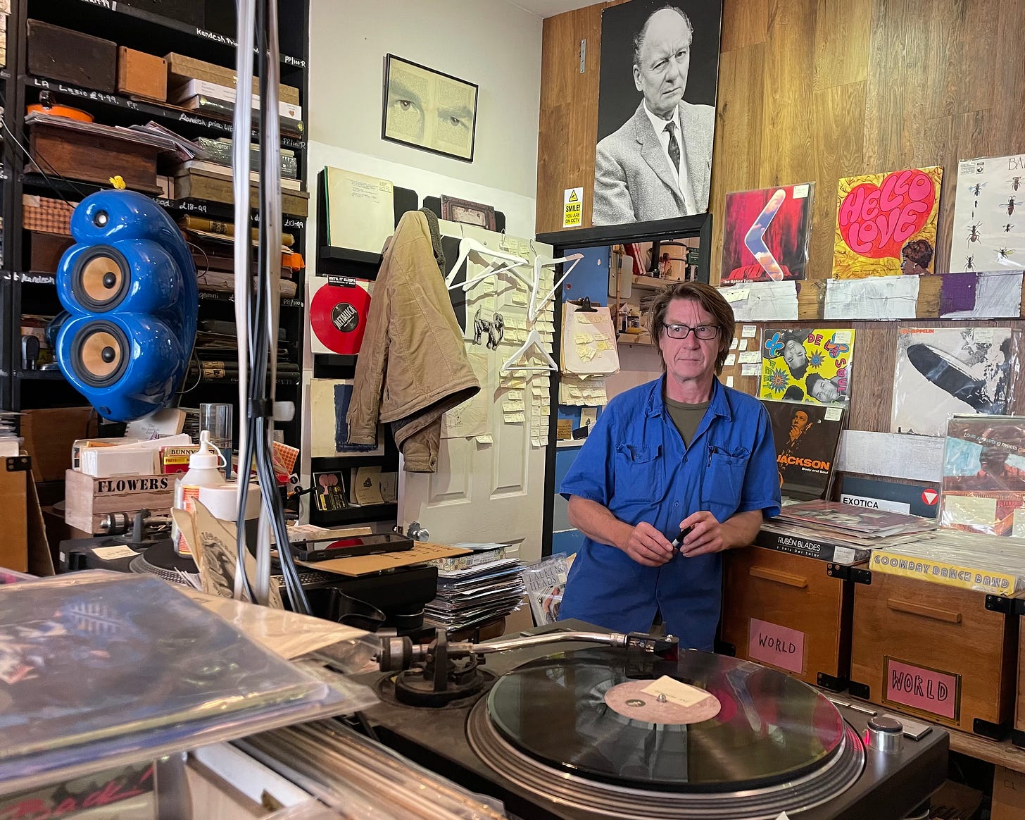 Mark takes care of sourcing the vinyl; Sir John is in charge of security