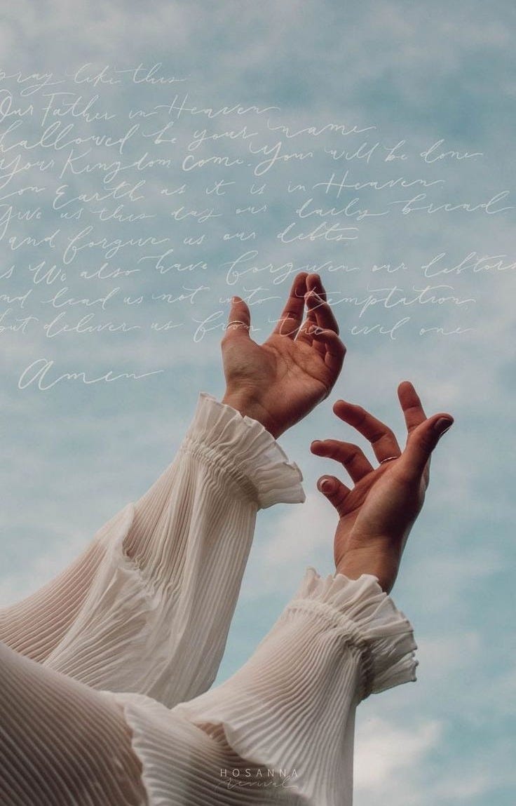 This may contain: two hands reaching up into the air with writing above them on a blue sky background