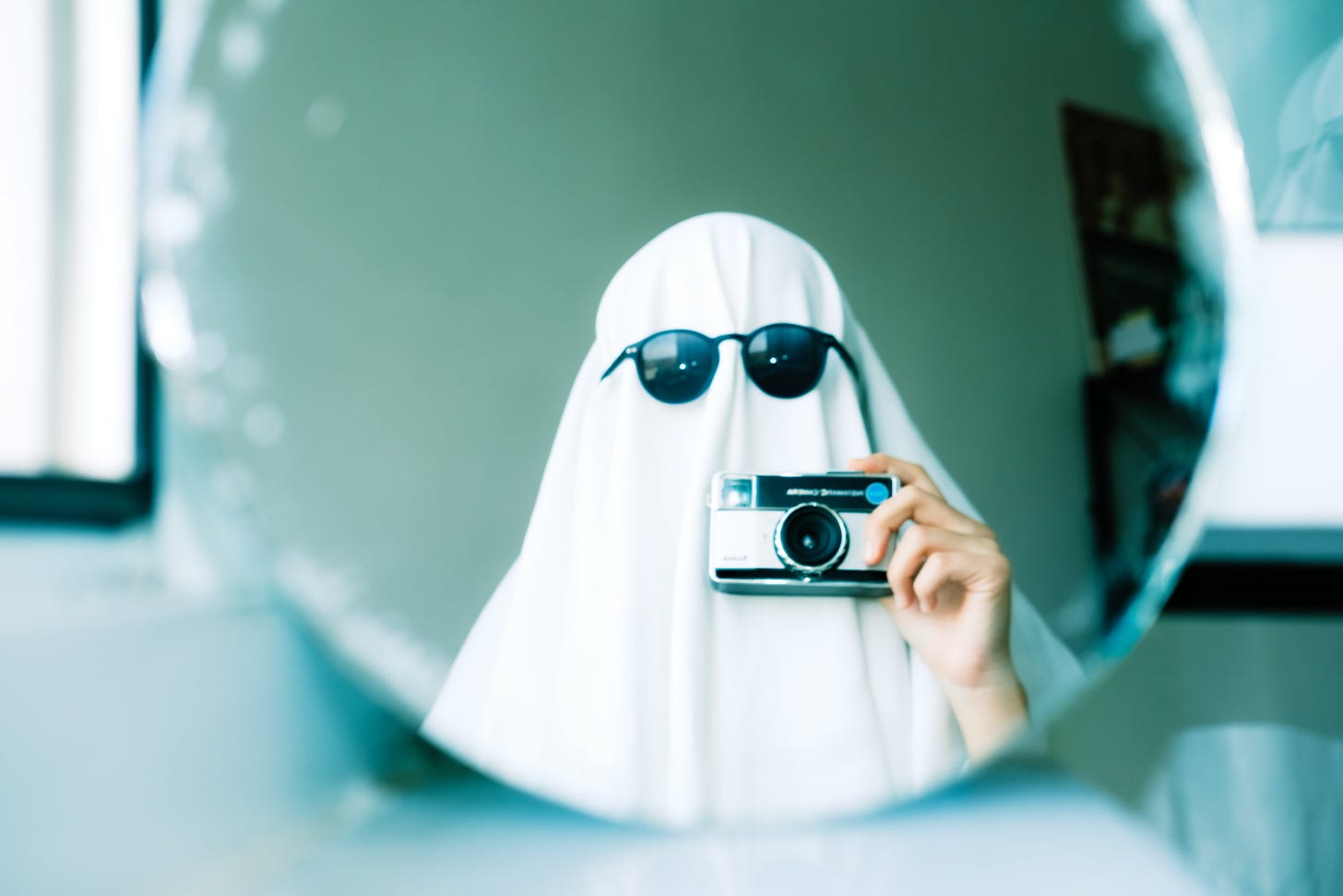 Ghost Holding a Camera