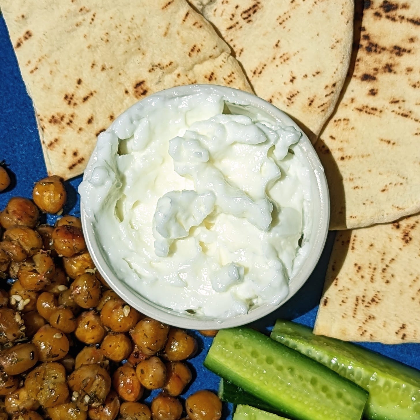 garlic spread with pita and chickpeas