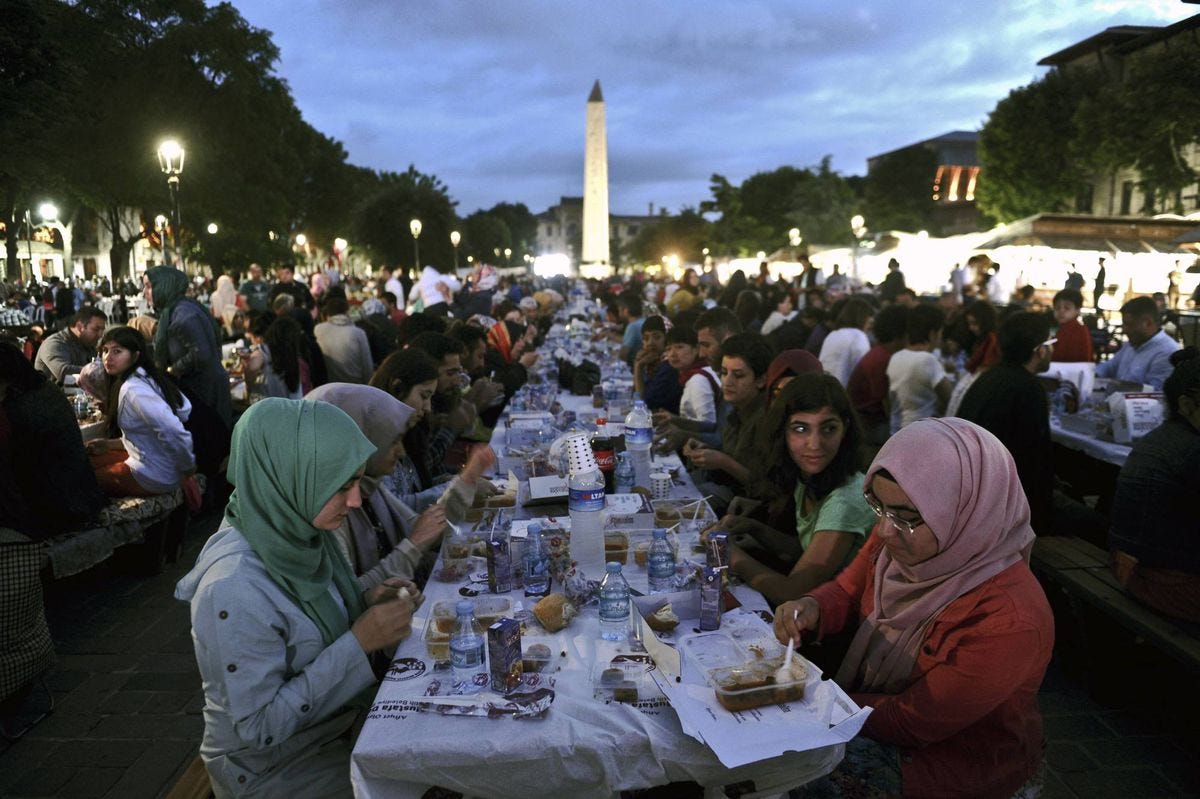 Breaking fast during Ramadan is a community event for millions of ...