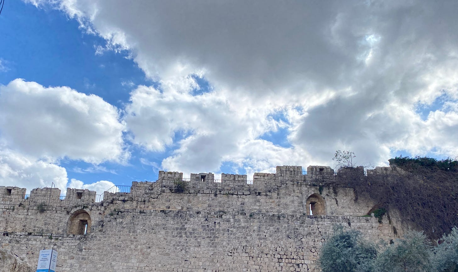 clouds over the old city of Jerusalem