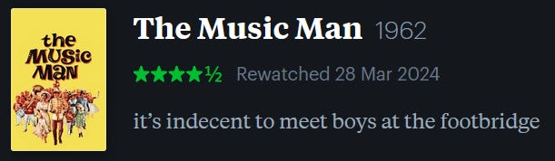 screenshot of LetterBoxd review of The Music Man, watched March 28, 2024: it’s indecent to meet boys at the footbridge