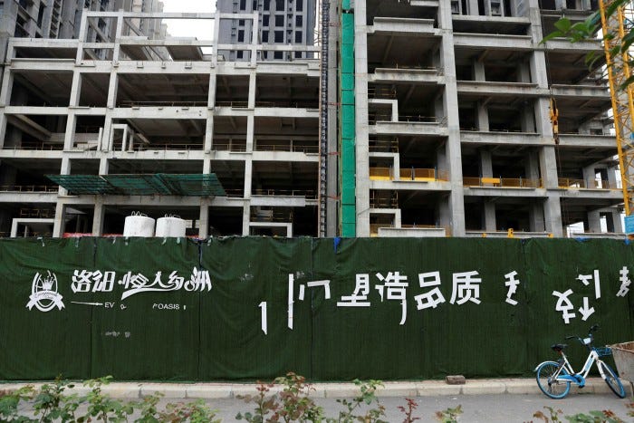 A housing complex developed by Evergrande sits unfinished in Luoyang