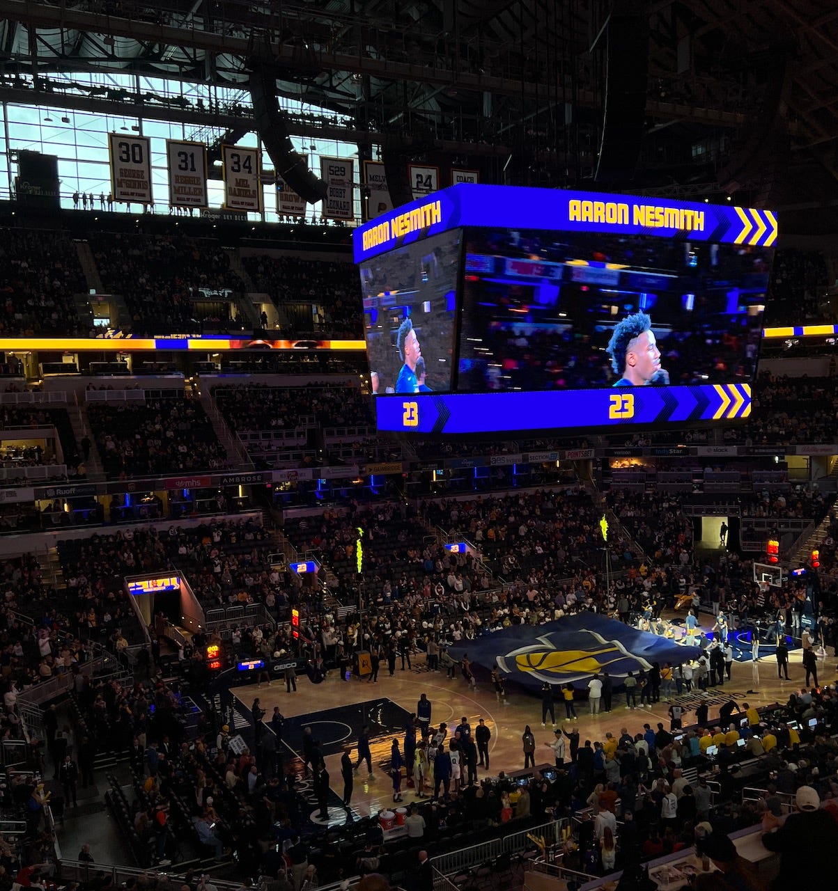 Lights off at Gainbridge Fieldhouse during team intros -- and the curtains opened.