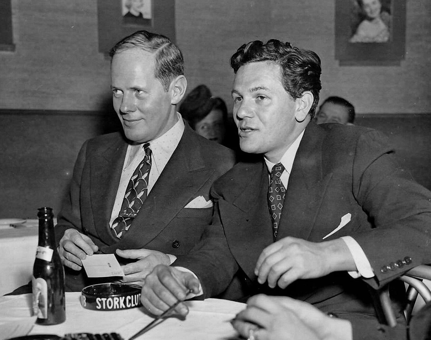 Sherman Billingsley, owner of the Stork Club in a table with actor John Garfield.