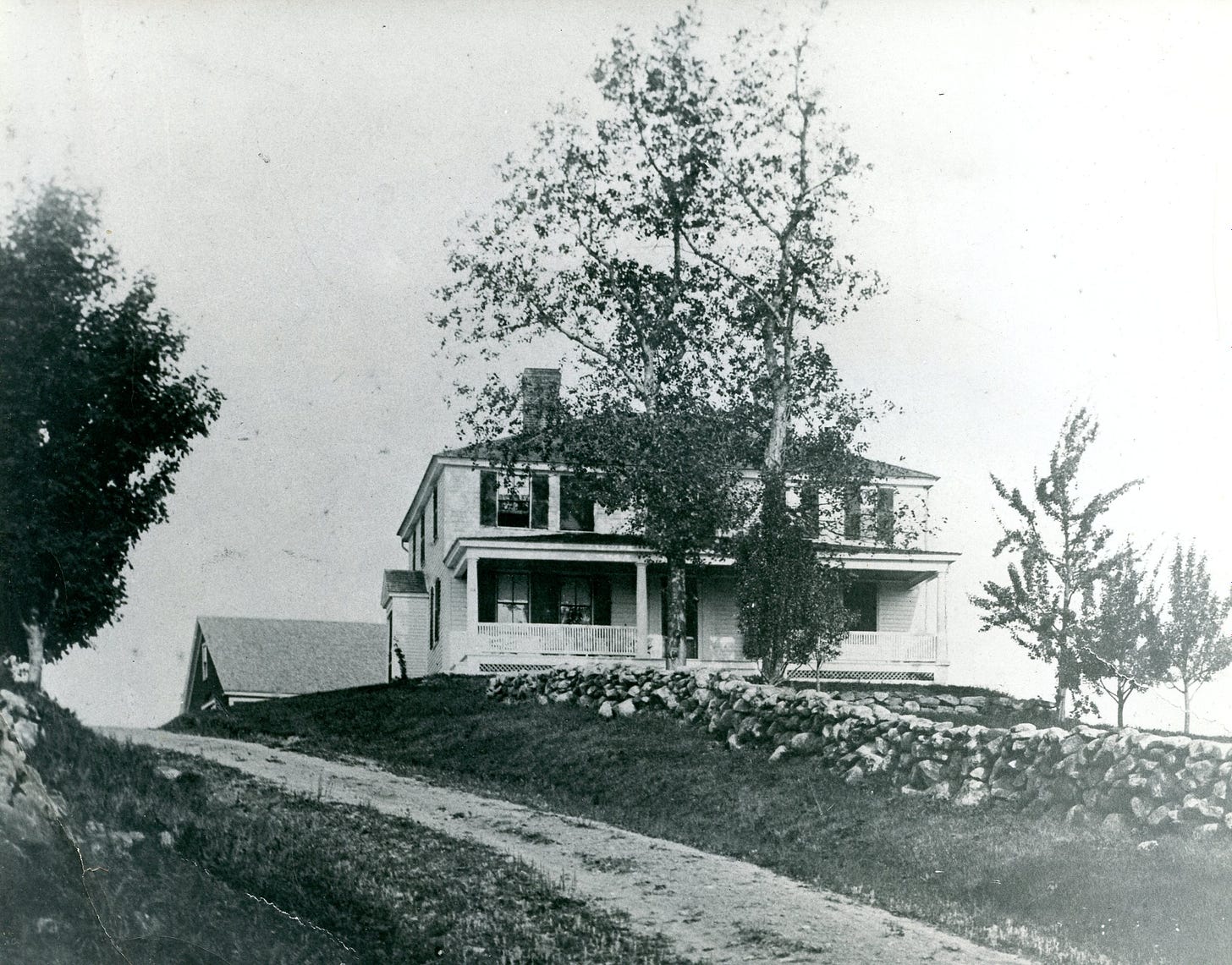 House with porch on hill