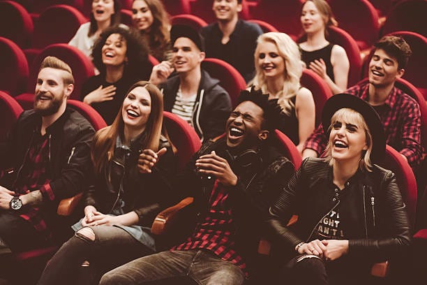 Multi Ethnic Group Of People In The Movie Theater Stock Photo - Download  Image Now - Humor, Performance, Audience - iStock