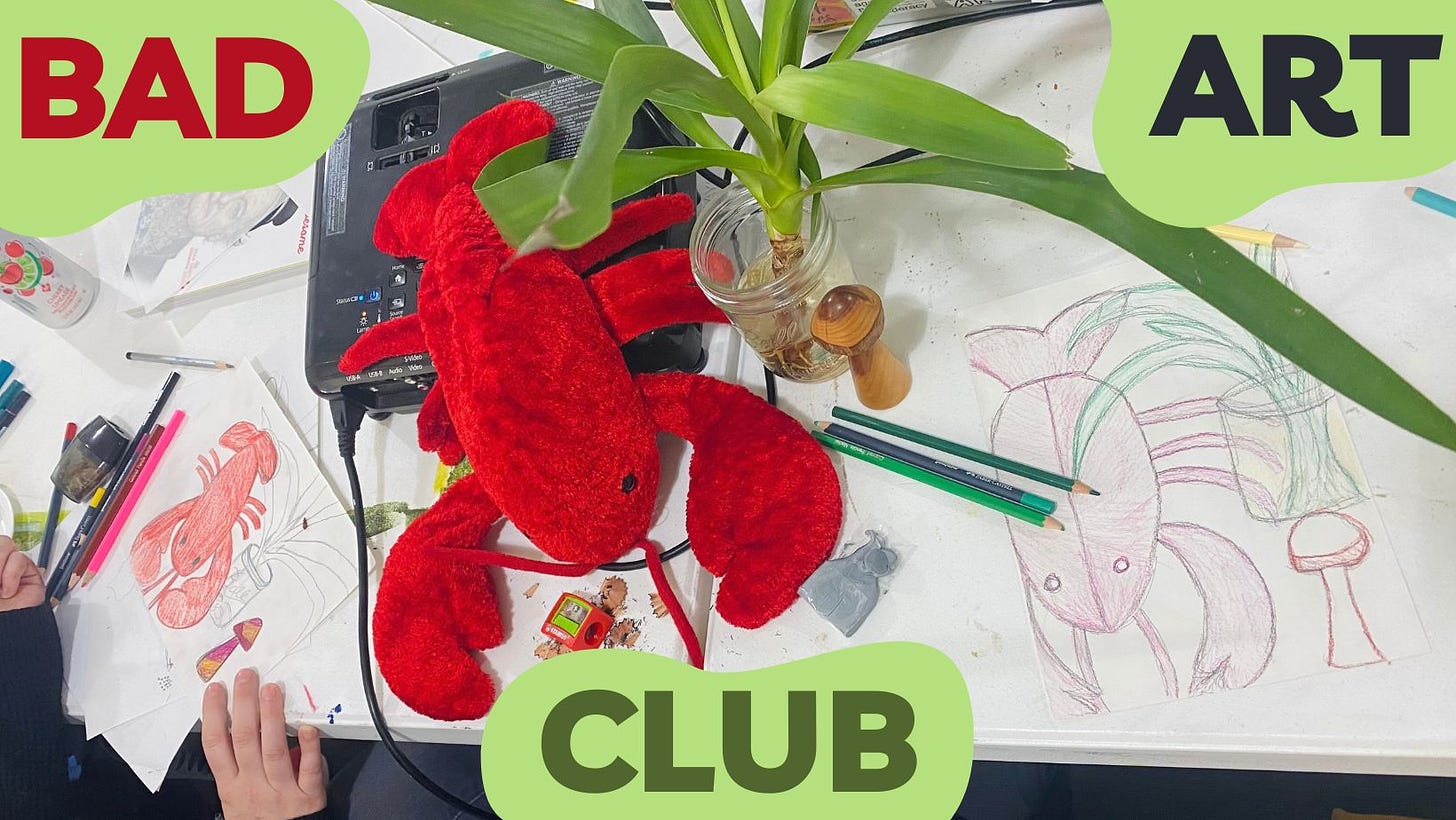 Workspace of two participants, drawing a still life featuring a giant lobster, plant in a mason jar, and mushroom. Colored pencils are scattered around. "Bad Art Club" is written on top of the image.