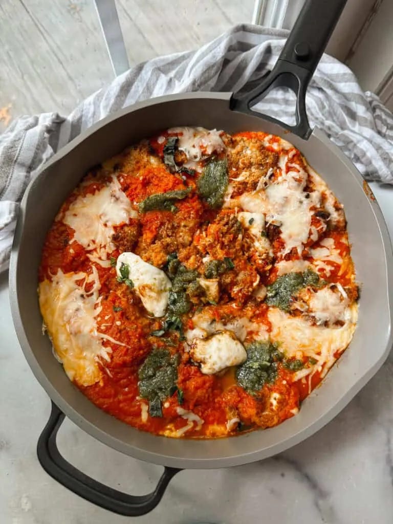 Skillet of Food on a counter top.