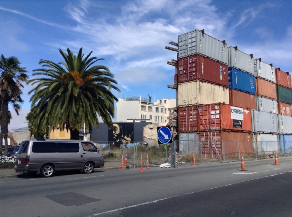 Shipping containers blocking or shielding an area