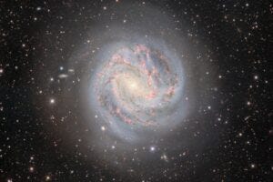 The outskirts of the Southern Pinwheel Galaxy, captured with the Department of Energy-fabricated Dark Energy Camera, mounted on the U.S. National Science Foundation Víctor M. Blanco 4-meter Telescope at Cerro Tololo Inter-American Observatory in Chile, a Program of NSF NOIRLab.