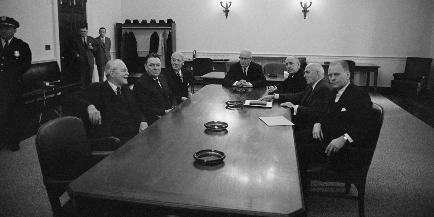 Chief Justice Earl Warren and other Washington luminaries at a table. The Warren Commission was appointed by President Johnson to investigate the assassination of John F. Kennedy.