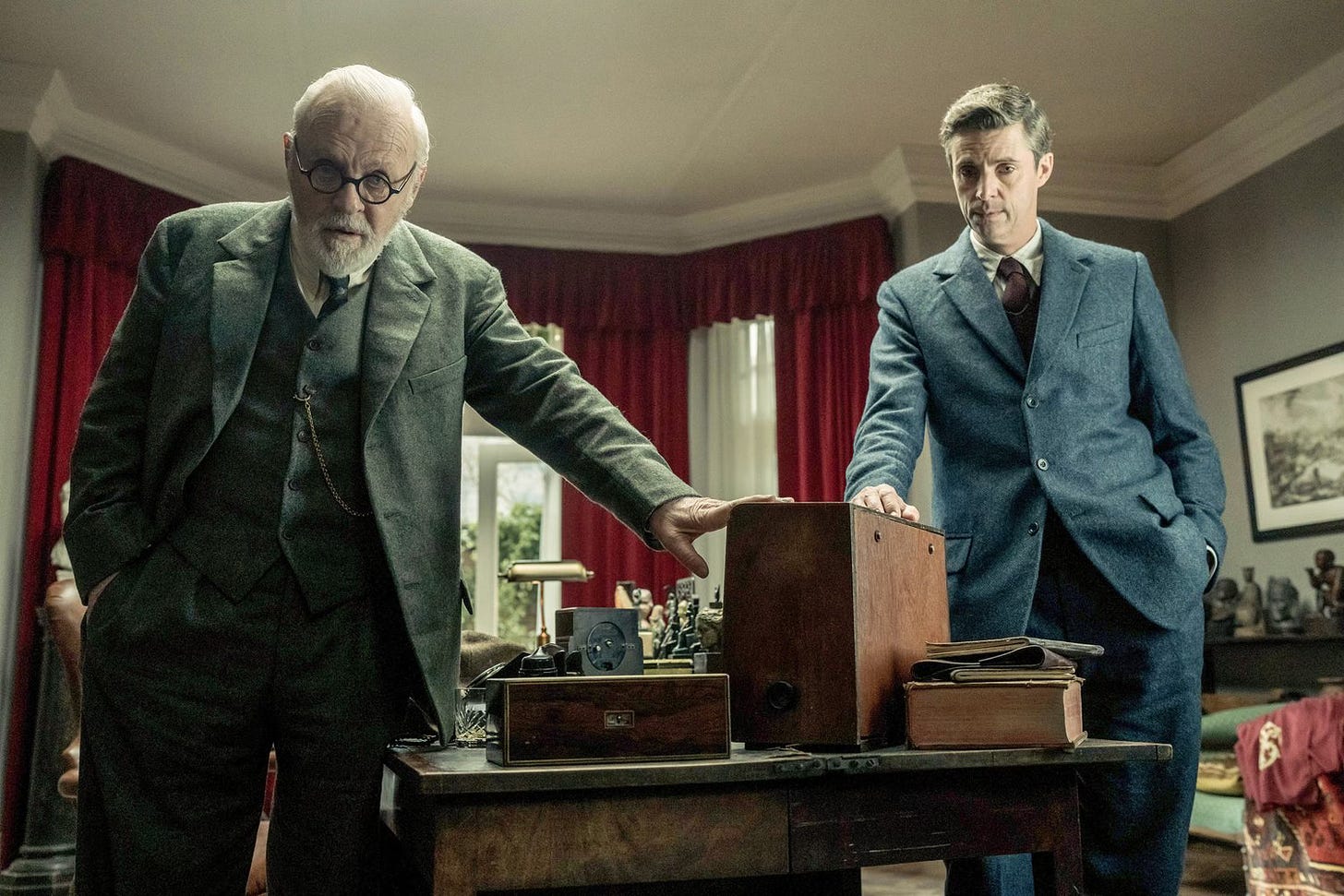 Still from the film Freud's Last Session featuring Anthony Hopkins and Matthew Goode