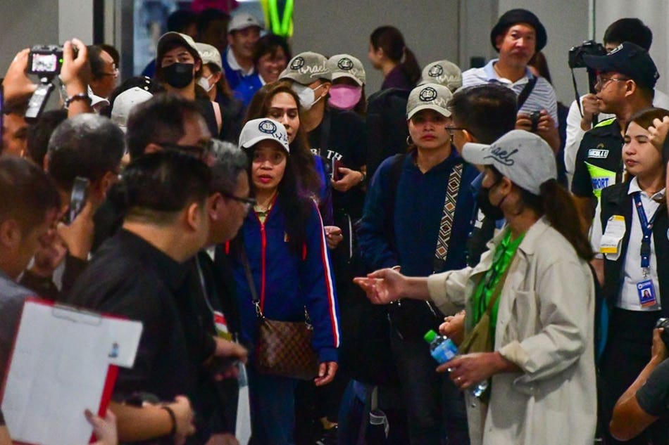 Filipino repatriates from Israel arrive at the NAIA Terminal 3 in Pasay City on October 18, 2023, amid the ongoing war between Israel and Hamas. There are 131 Filipinos in Gaza are waiting to cross Egypt for their assistance and repatriation, according to the Overseas Workers Welfare Administration. Mark Demayo, ABS-CBN News