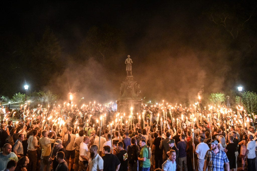 Torch-carrying white nationalists indicted in 2017 Charlottesville rally |  PBS NewsHour