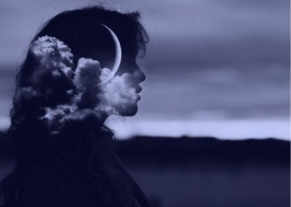 woman with clouds and moon in her silhouette