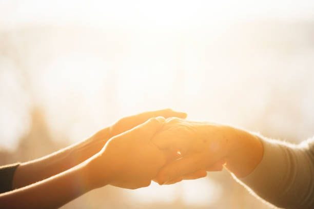 old and young support - gentleness stock pictures, royalty-free photos & images